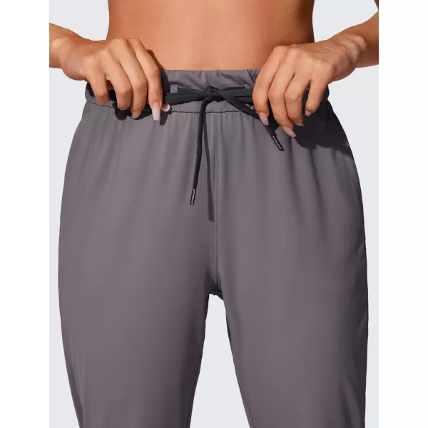 CRZ YOGA 4Way Stretch Workout Joggers for Women 28quot  Casual Travel Pants Lounge Athletic Joggers with PocketsTornado Grey