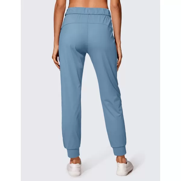 CRZ YOGA 4Way Stretch Workout Joggers for Women 28quot  Casual Travel Pants Lounge Athletic Joggers with PocketsUniverse Blue