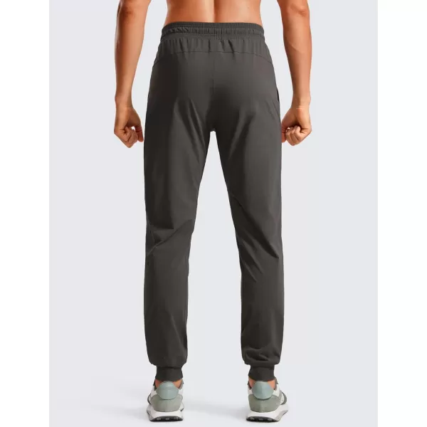 CRZ YOGA Athletic Joggers for Men 31quot Lightweight Water Resistant Outdoor Workout Pants with Zip PocketsArbor Olive