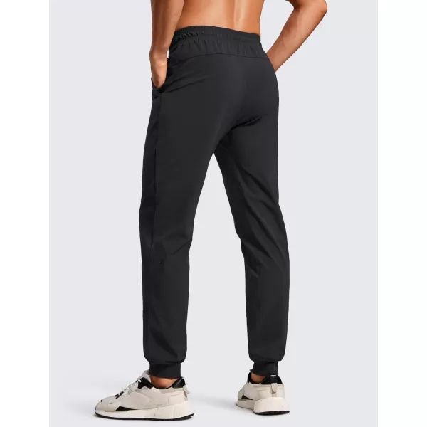 CRZ YOGA Athletic Joggers for Men 31quot Lightweight Water Resistant Outdoor Workout Pants with Zip PocketsBlack