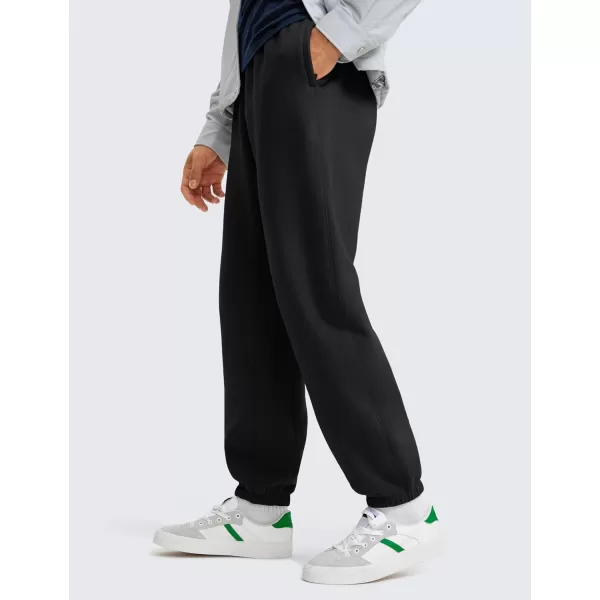 CRZ YOGA Cotton Fleece Sweatpants for Men 32quot Loosed Fit Lounge Casual Elastic Bottom Sweat Pants with Zipper PocketsBlack