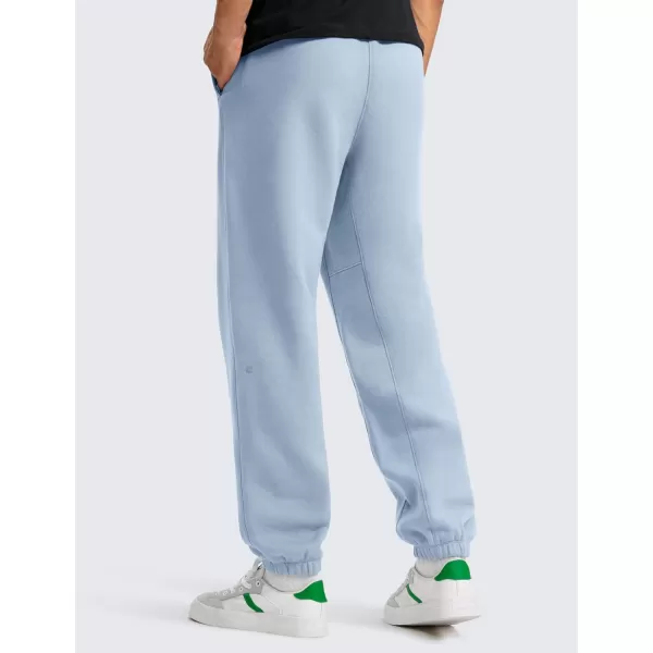 CRZ YOGA Cotton Fleece Sweatpants for Men 32quot Loosed Fit Lounge Casual Elastic Bottom Sweat Pants with Zipper PocketsCambric Blue
