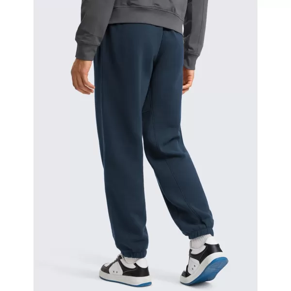 CRZ YOGA Cotton Fleece Sweatpants for Men 32quot Loosed Fit Lounge Casual Elastic Bottom Sweat Pants with Zipper PocketsInk Blue