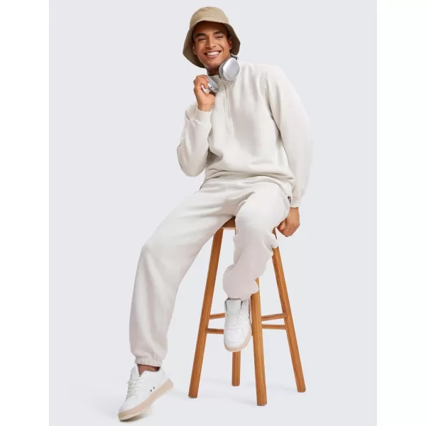 CRZ YOGA Cotton Fleece Sweatpants for Men 32quot Loosed Fit Lounge Casual Elastic Bottom Sweat Pants with Zipper PocketsMilky White Bone