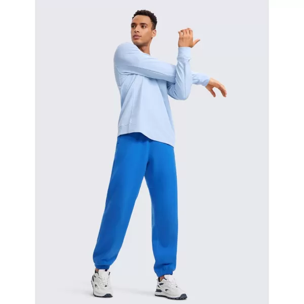 CRZ YOGA Cotton Fleece Sweatpants for Men 32quot Loosed Fit Lounge Casual Elastic Bottom Sweat Pants with Zipper PocketsSparkle Blue