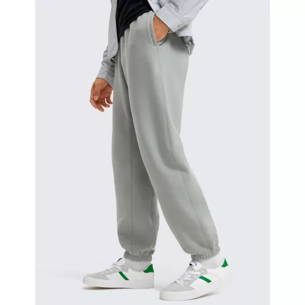 CRZ YOGA Cotton Fleece Sweatpants for Men 32quot Loosed Fit Lounge Casual Elastic Bottom Sweat Pants with Zipper PocketsSterling