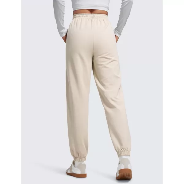 CRZ YOGA Fleece Sweatpants Women Cotton Joggers High Waisted Lounge Casual Travel Elastic Bottom Pants with PocketsMojave Tan