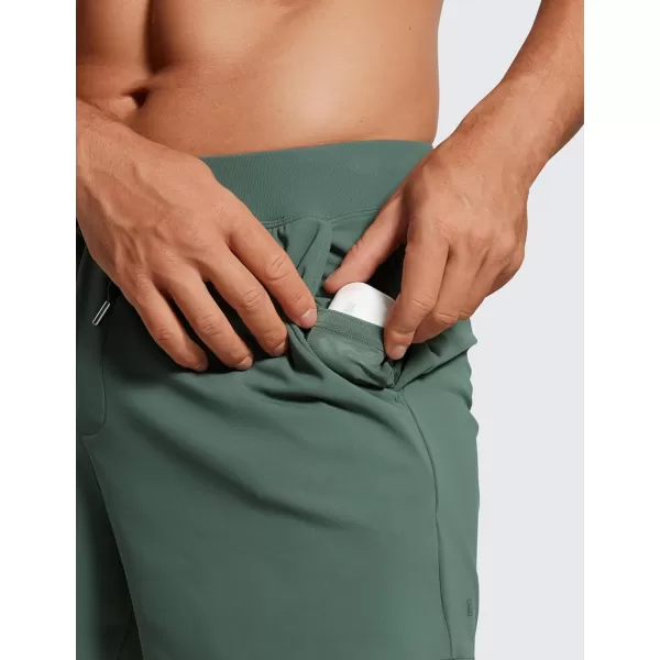 CRZ YOGA Mens FourWay Stretch Workout Shorts  5quot Soft Durable Casual Athletic Shorts with Pocket Gym Running HikingDark Forest Green
