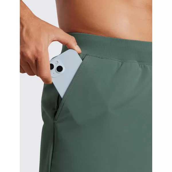 CRZ YOGA Mens FourWay Stretch Workout Shorts  5quot Soft Durable Casual Athletic Shorts with Pocket Gym Running HikingDark Forest Green