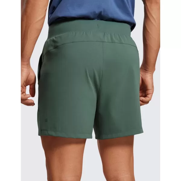 CRZ YOGA Mens FourWay Stretch Workout Shorts  5quot Soft Durable Casual Athletic Shorts with Pocket Gym Running HikingDark Forest Green