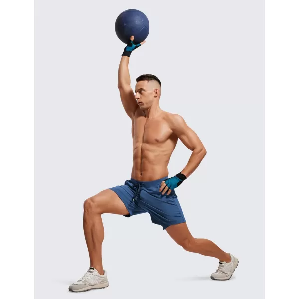 CRZ YOGA Mens FourWay Stretch Workout Shorts  5quot Soft Durable Casual Athletic Shorts with Pocket Gym Running HikingPitch Blue
