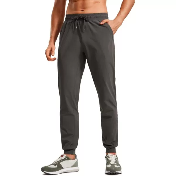 CRZ YOGA Athletic Joggers for Men 31quot Lightweight Water Resistant Outdoor Workout Pants with Zip PocketsArbor Olive