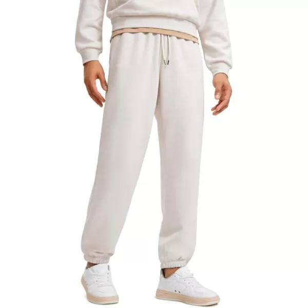 CRZ YOGA Cotton Fleece Sweatpants for Men 32quot Loosed Fit Lounge Casual Elastic Bottom Sweat Pants with Zipper PocketsMilky White Bone