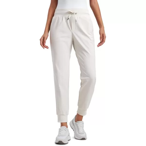 imageCRZ YOGA All Day Comfy Joggers for Women Golf Work Casual Hiking Travel Pants with PocketsMilky White Bone