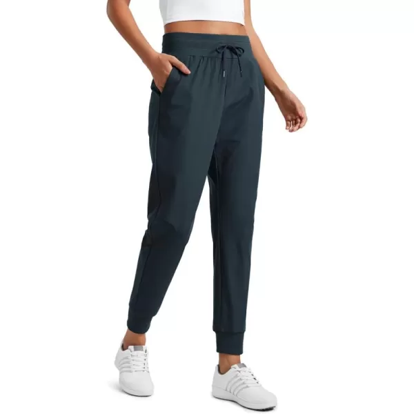 imageCRZ YOGA All Day Comfy Joggers for Women Golf Work Casual Hiking Travel Pants with PocketsTrue Navy