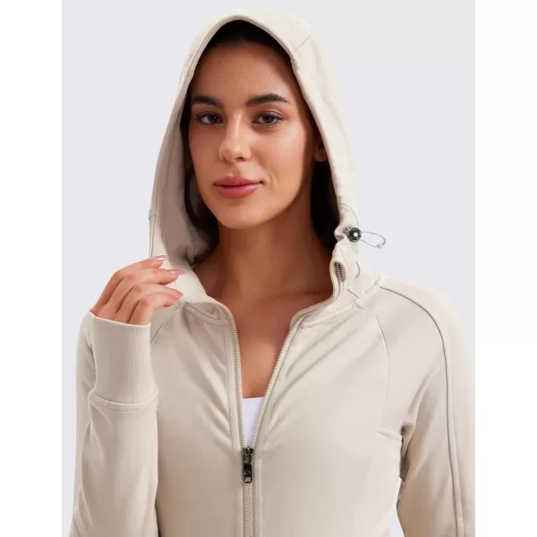 imageCRZ YOGA Womens Fleece Full Zip Hoodie Workout Hooded Zipper Sweatshirts Basic Casual Jackets with Thumb HolesMojave Tan