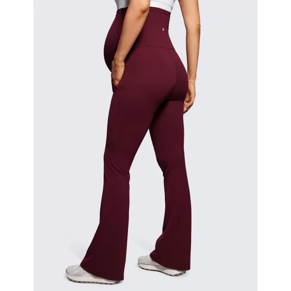 imageCRZ YOGA Women Butterluxe Maternity Flare Leggings with Pockets 31quot  Workout Active Yoga Pregnancy Pants Over The Belly SoftRed Merlot