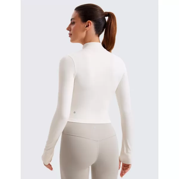 imageCRZ YOGA Womens Butterluxe Full Zip Cropped Workout Jackets Slim Fit Lightweight Athletic Yoga Jacket with Thumb HolesWhite Apricot