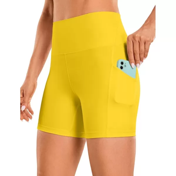 imageCRZ YOGA Womens Butterluxe Biker Shorts with Pockets 5 Inches  High Waisted Volleyball Workout Athletic Yoga Short LeggingsHigh Visibility Yellow