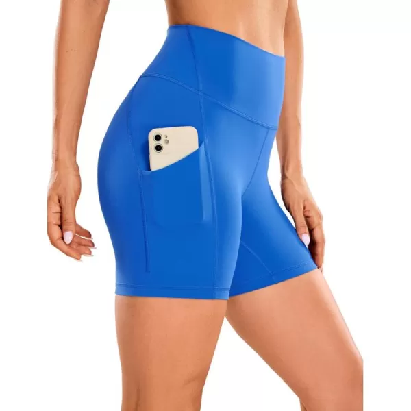 imageCRZ YOGA Womens Butterluxe Biker Shorts with Pockets 5 Inches  High Waisted Volleyball Workout Athletic Yoga Short LeggingsSparkle Blue