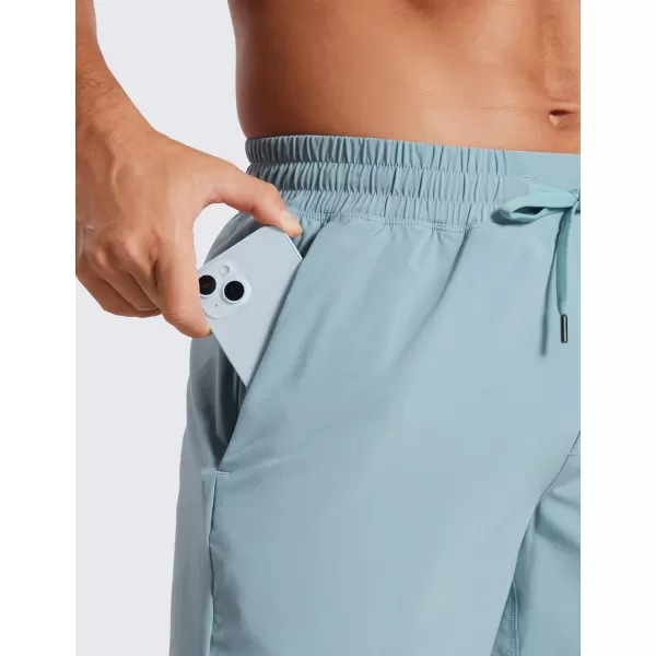 imageCRZ YOGA Mens 2 in 1 Running Shorts with Liner  5 Quick Dry Workout Sports Athletic Shorts with PocketsLight Grayish Blue