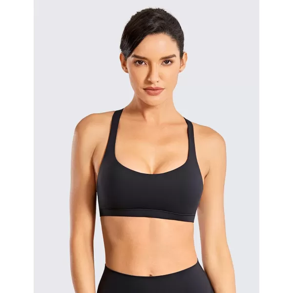 imageCRZ YOGA Strappy Sports Bras for Women  Criss Cross Back Sexy Wireless Padded Yoga Bra Cute WorkoutBlack