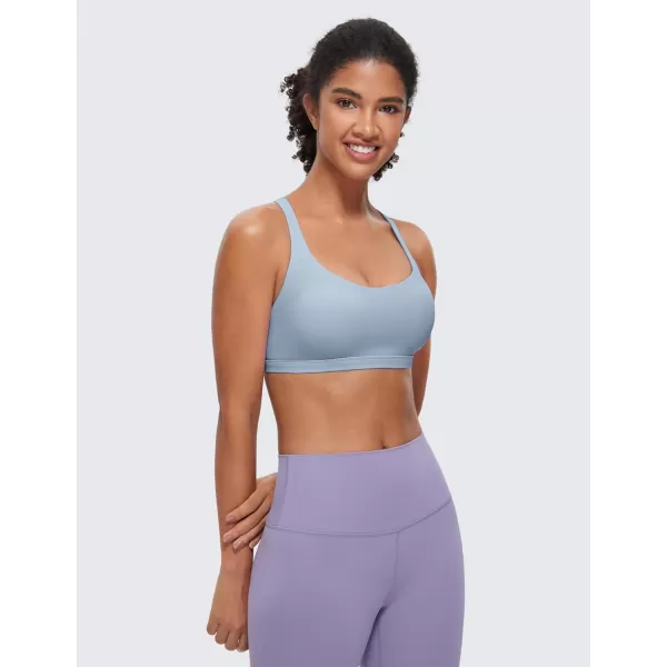 imageCRZ YOGA Strappy Sports Bras for Women  Criss Cross Back Sexy Wireless Padded Yoga Bra Cute WorkoutCambric Blue
