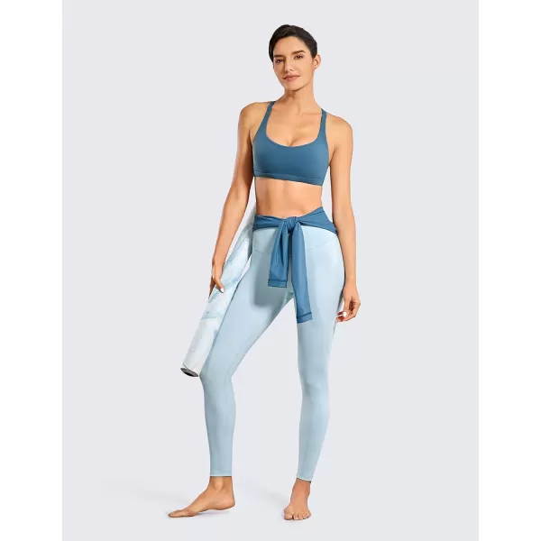imageCRZ YOGA Strappy Sports Bras for Women  Criss Cross Back Sexy Wireless Padded Yoga Bra Cute WorkoutPetrol Blue