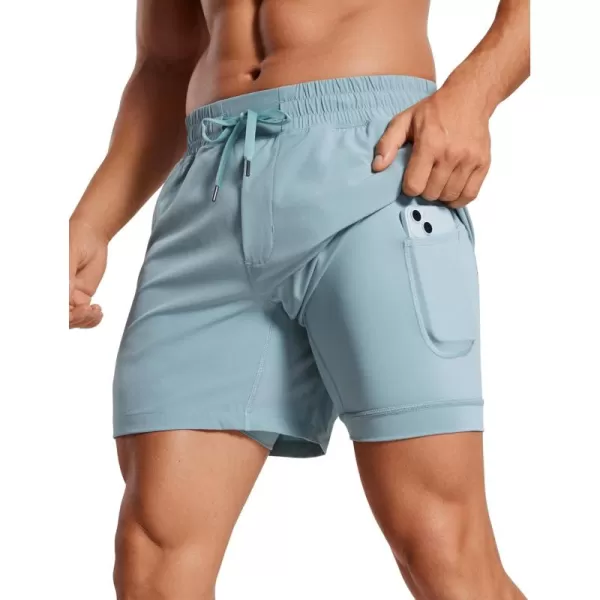 imageCRZ YOGA Mens 2 in 1 Running Shorts with Liner  5 Quick Dry Workout Sports Athletic Shorts with PocketsLight Grayish Blue