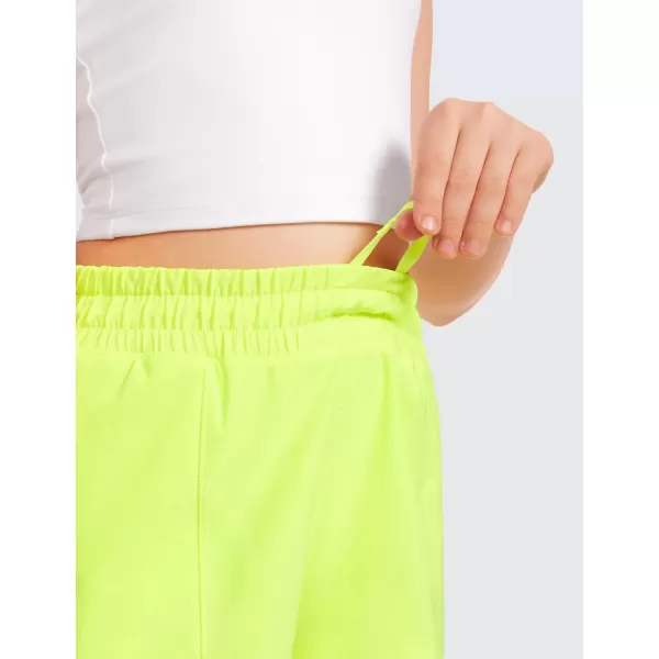 imageCRZ YOGA Girls Athletic Shorts with Zipper Pocket Lightweight Running Shorts for Teen Girls Kids LinerNeon Yellow