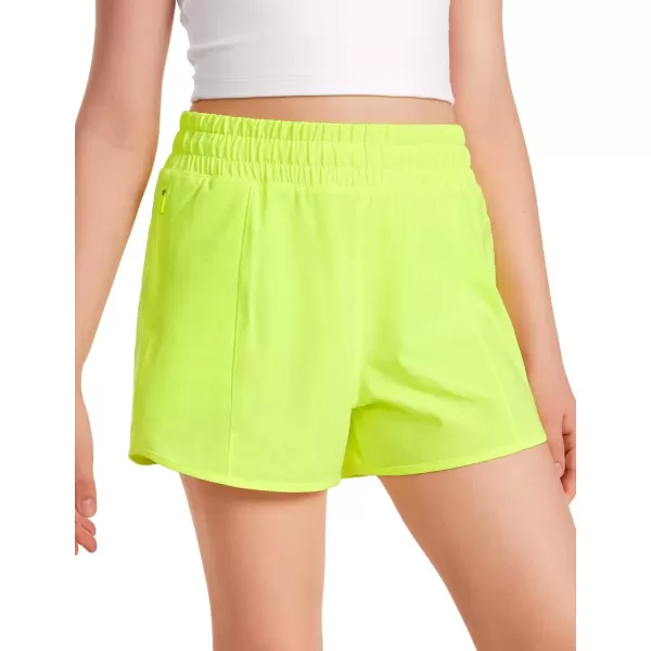 imageCRZ YOGA Girls Athletic Shorts with Zipper Pocket Lightweight Running Shorts for Teen Girls Kids LinerNeon Yellow