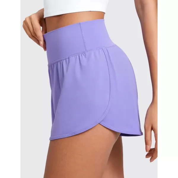 imageCRZ YOGA ButterluxeLight High Waisted Dolphin Shorts for Women 25quot Soft Split Casual Lounge Athletic Yoga Shorts LinerDark Lavender Purple