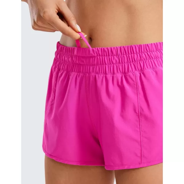 imageCRZ YOGA Womens Running Shorts Low Waisted 25quot  Mesh Liner Quick Dry Track Gym Athletic Workout Shorts with Zip PocketHibiscus Purple