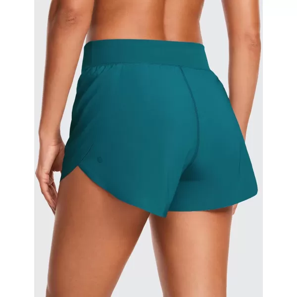 imageCRZ YOGA High Waisted Dolphin Athletic Running Shorts for Women 3quot High Split Comfy Mesh Liner Gym Workout Track ShortsBorealis Green