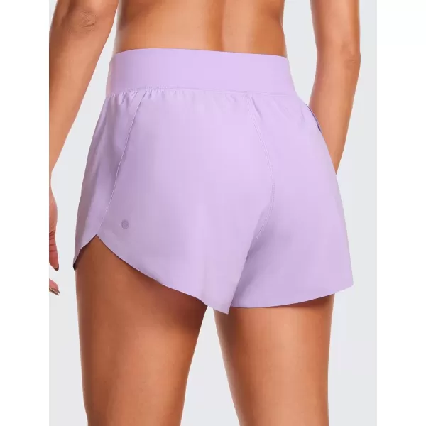 imageCRZ YOGA High Waisted Dolphin Athletic Running Shorts for Women 3quot High Split Comfy Mesh Liner Gym Workout Track ShortsLilac