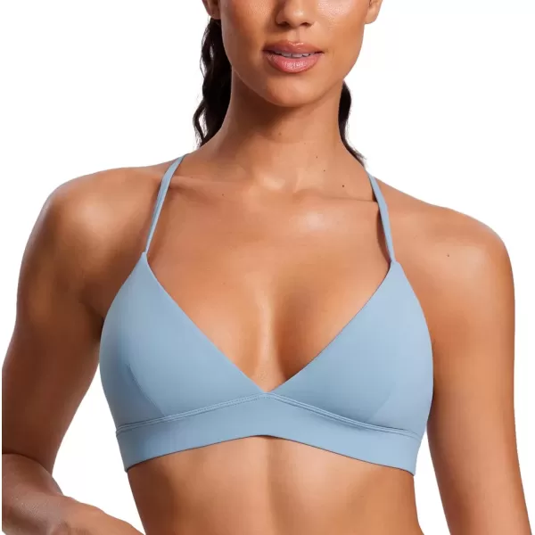 imageCRZ YOGA Womens Double Lined Triangle Strappy Sports Bra  Adjustable Spaghetti Straps Wireless Bra Sexy Workout Yoga BraThe Breeze Blue