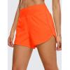 imageCRZ YOGA High Waisted Running Shorts for Women  4 Liner Gym Athletic Workout Shorts with Zipper Pocket BreathableNeon Orange