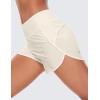 imageCRZ YOGA High Waisted Running Shorts for Women  4 Liner Gym Athletic Workout Shorts with Zipper Pocket BreathableWhite Apricot