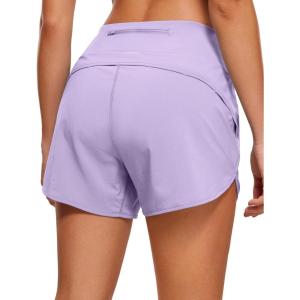 imageCRZ YOGA High Waisted Running Shorts for Women  4 Liner Gym Athletic Workout Shorts with Zipper Pocket BreathableLilac