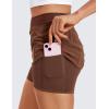 imageCRZ YOGA A Line Golf Skirts for Women High Waisted Casual Tennis Pickleball Athletic Skorts with Shorts PocketsCoffee Brown