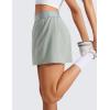 imageCRZ YOGA A Line Golf Skirts for Women High Waisted Casual Tennis Pickleball Athletic Skorts with Shorts PocketsSterling