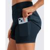 imageCRZ YOGA A Line Golf Skirts for Women High Waisted Casual Tennis Pickleball Athletic Skorts with Shorts PocketsTrue Navy