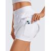 imageCRZ YOGA A Line Golf Skirts for Women High Waisted Casual Tennis Pickleball Athletic Skorts with Shorts PocketsWhite