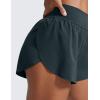 imageCRZ YOGA High Waisted Dolphin Athletic Running Shorts for Women 3quot High Split Comfy Mesh Liner for Gym Workout TrackMelanite