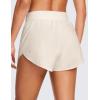 imageCRZ YOGA High Waisted Dolphin Athletic Running Shorts for Women 3quot High Split Comfy Mesh Liner for Gym Workout TrackWhite Apricot