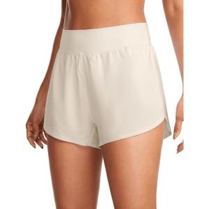 imageCRZ YOGA High Waisted Dolphin Athletic Running Shorts for Women 3quot High Split Comfy Mesh Liner for Gym Workout TrackWhite Apricot