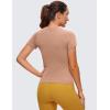 imageCRZ YOGA Seamless Workout Tops for Women Short Sleeve Athletic Tees Breathable Gym Running Yoga ShirtsMocha Mousse