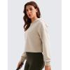 imageCRZ YOGA Womens SoftAura Cropped Hoodie Long Sleeve Hooded Sweatshirt Basic Workout Casual PulloverMojave Tan