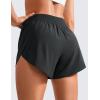 imageCRZ YOGA Mid Waisted Dolphin Athletic Shorts for Women 4quot Lightweight High Split for Gym Workout with Liner Quick DryBlack