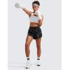 imageCRZ YOGA Mid Waisted Dolphin Athletic Shorts for Women 4quot Lightweight High Split for Gym Workout with Liner Quick DryBlack Tie Dye Flowers